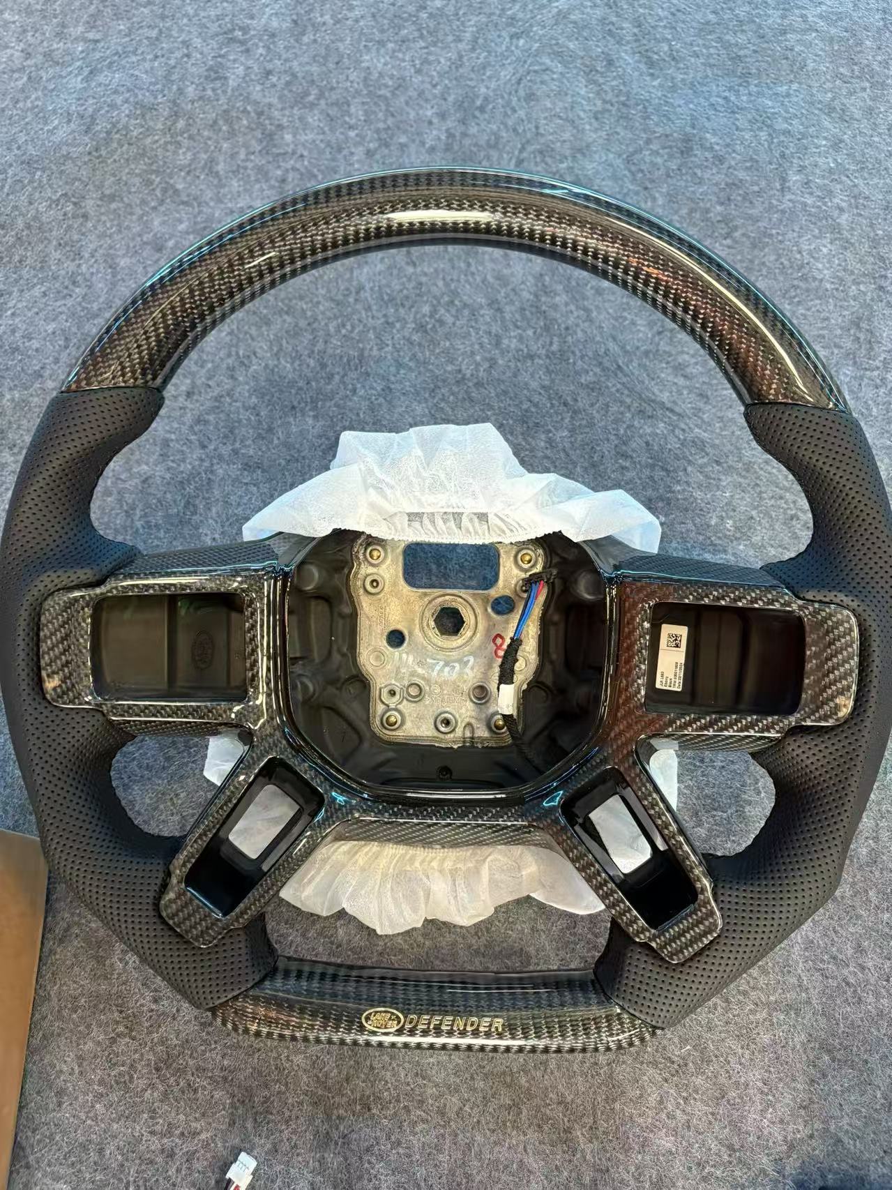 Defender L663 carbon fiber steering wheel